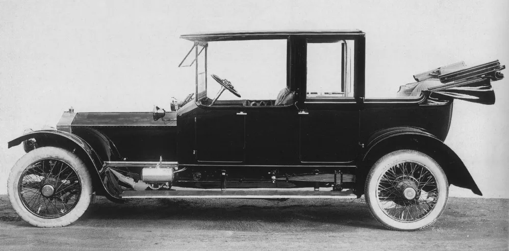 A period photograph of a Rolls-Royce Silver Ghost Landaulette by Hooper & Co., with a collapsible hood section above the rear seats.