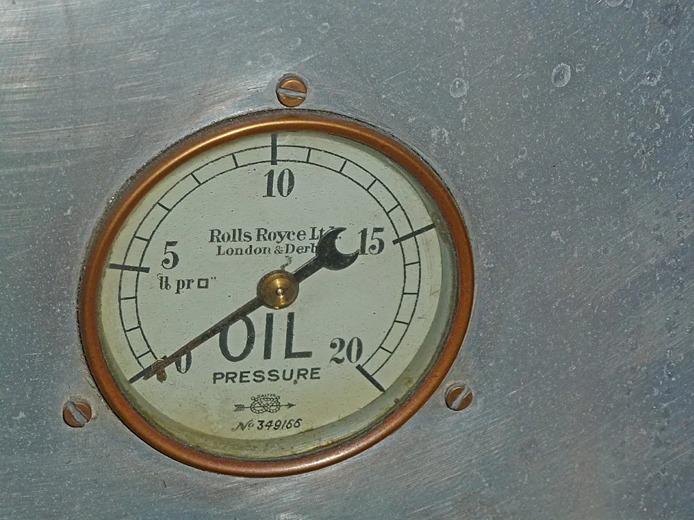 Close-up of the original oil pressure gauge made to the order of Rolls-Royce, London & Derby.